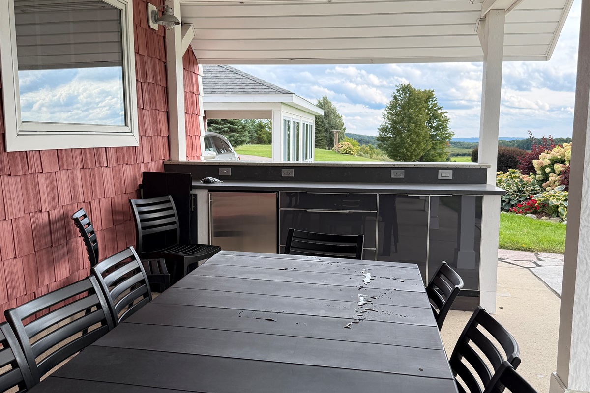 The outdoor kitchen allows you to stay close and enjoy the fall weather.