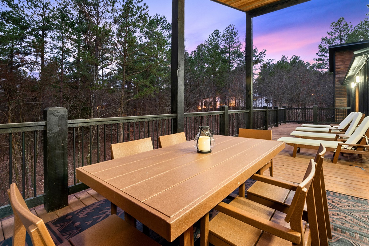 A private dining space on the deck, where you can enjoy meals surrounded by towering pines.