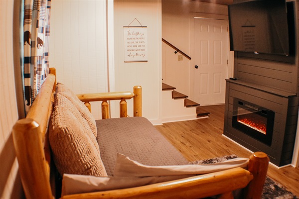 The Cozy Electric Fireplace that is a great source of heat in the winter and beautiful all year.  Feel free to change the color and style of the flames however you like. Use the remote or the touch screen buttons on the fireplace.