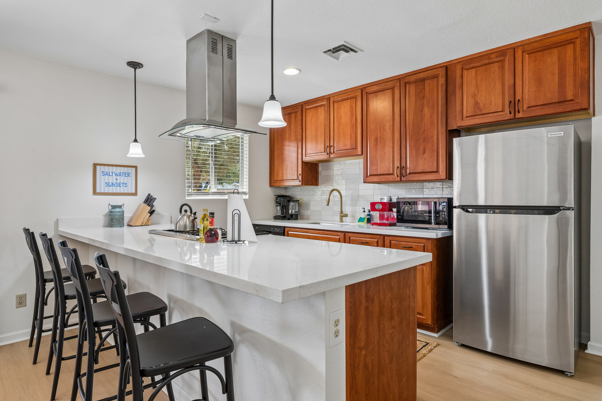 This fully stocked kitchen has been upgraded to ensure the meals you cook here have all the supplies needed.
