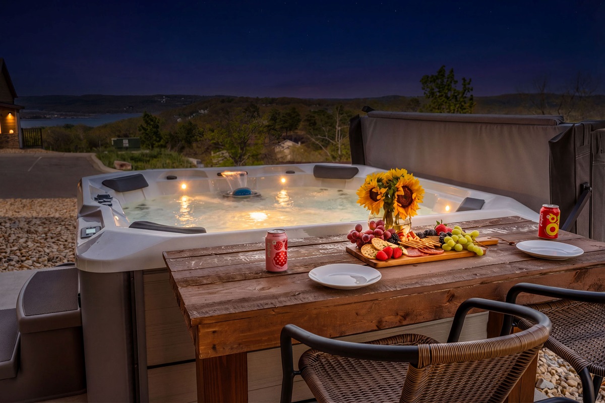 Unwind in the private hot tub with beautiful Table Rock Lake views, then step over to the outdoor bartop with seating—perfect for charcuterie, cocktails, and watching the sunset after a day on the lake.