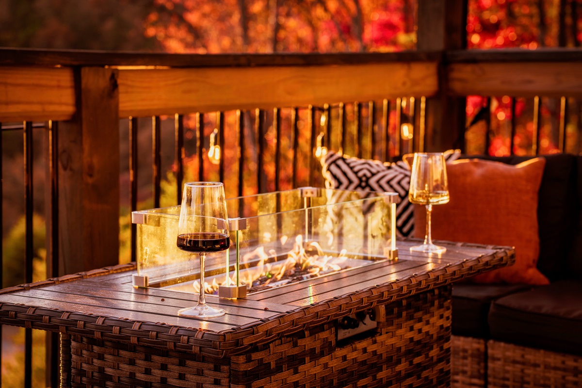 A toast-worthy setup. Wine, fresh air, and cabin calm.