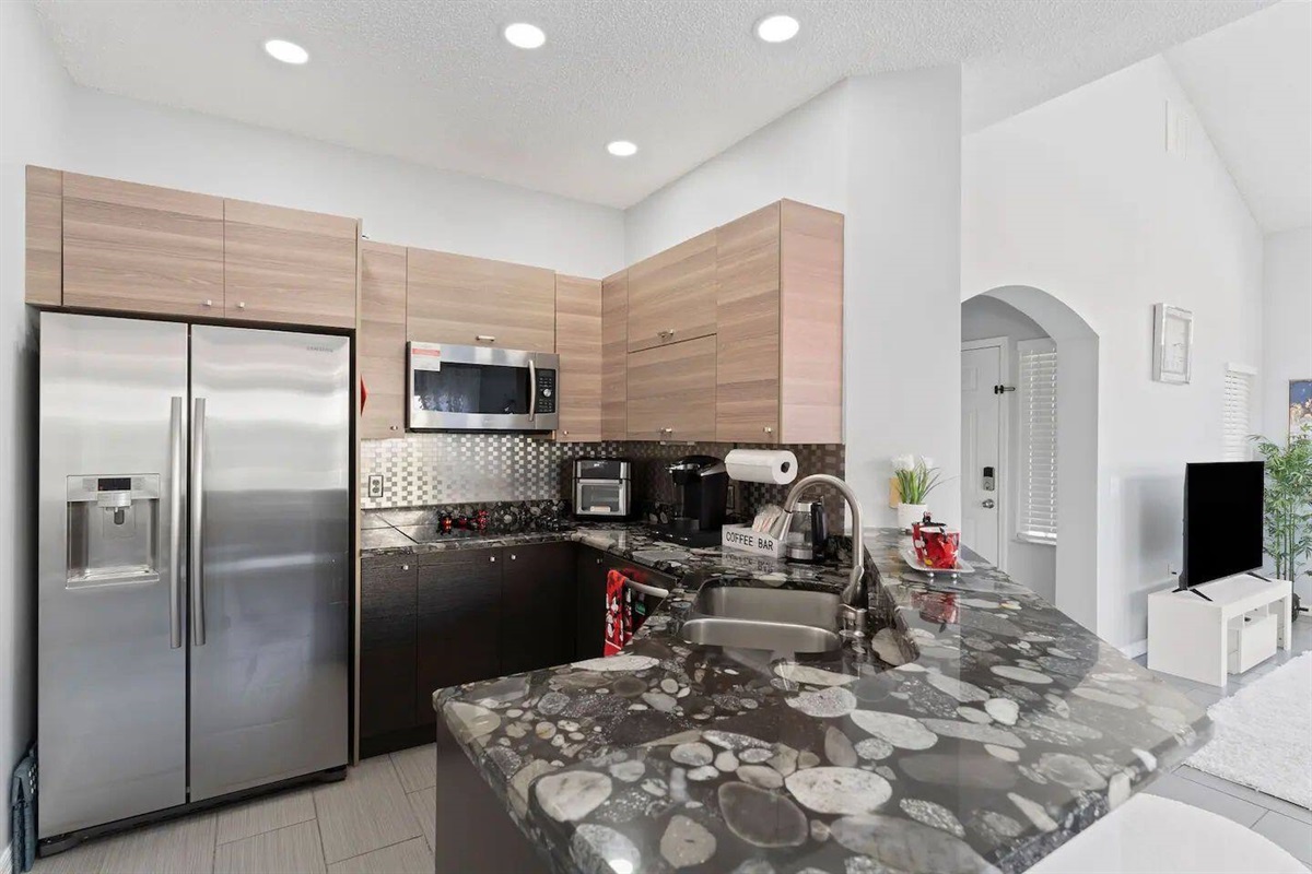 Kitchen is fully equipped for you to cook during your stay. All of this is designed to be open and family ready.