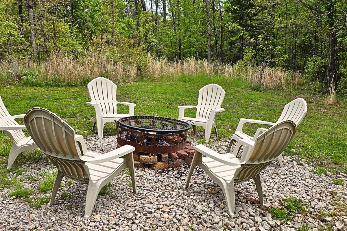 Gather around the fire pit under the stars and share stories, roast marshmallows, or just soak up the stillness of the woods. With comfy chairs and a grill top, it's the perfect spot for late-night laughs or rustic outdoor meals.