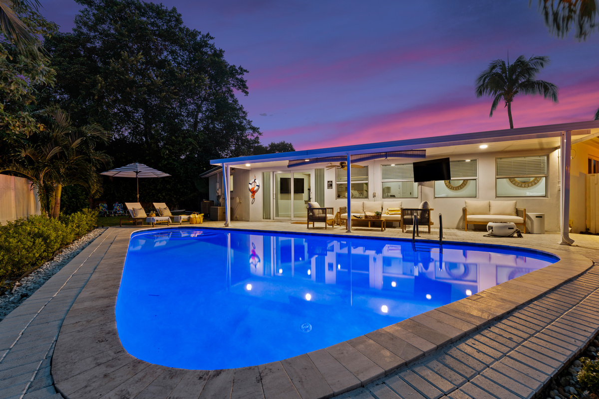Take a sunset swim under the evening sky