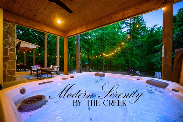 Relax in soothing bubbles while enjoying  view of the seasonal creek