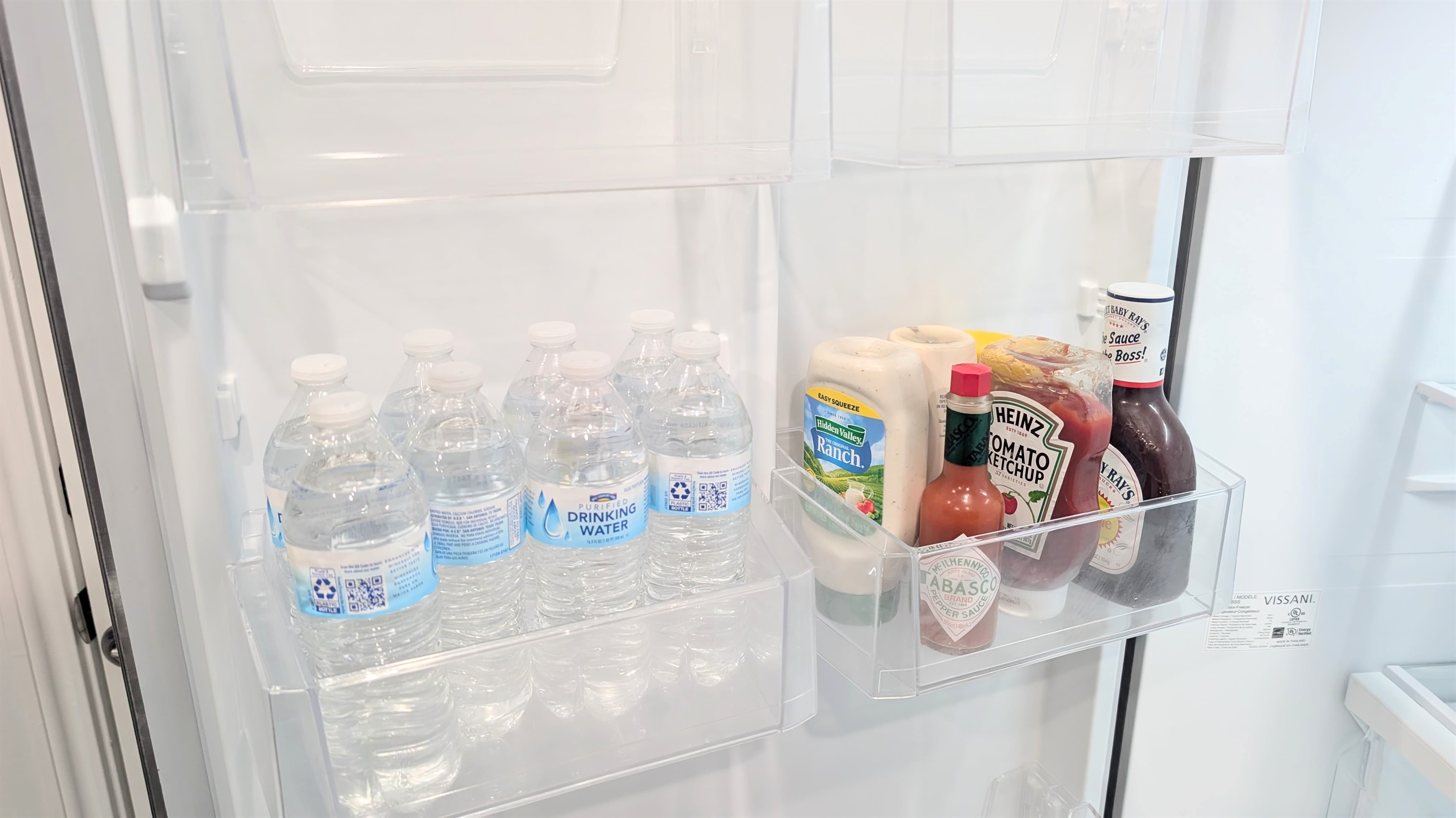 Bottled water and condiments provided.