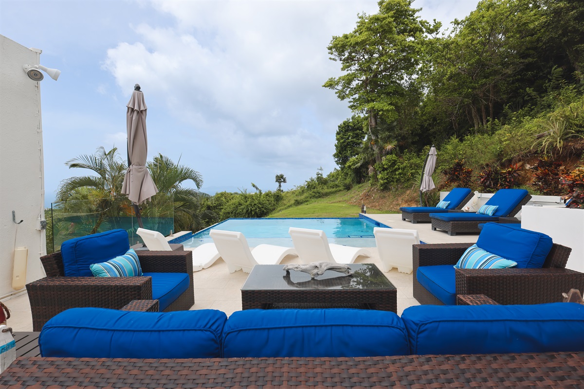 Private oasis with ample seating, perfect for outdoor gatherings.