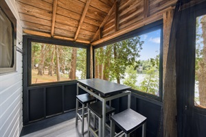 Inside of the screened porch with indoor living