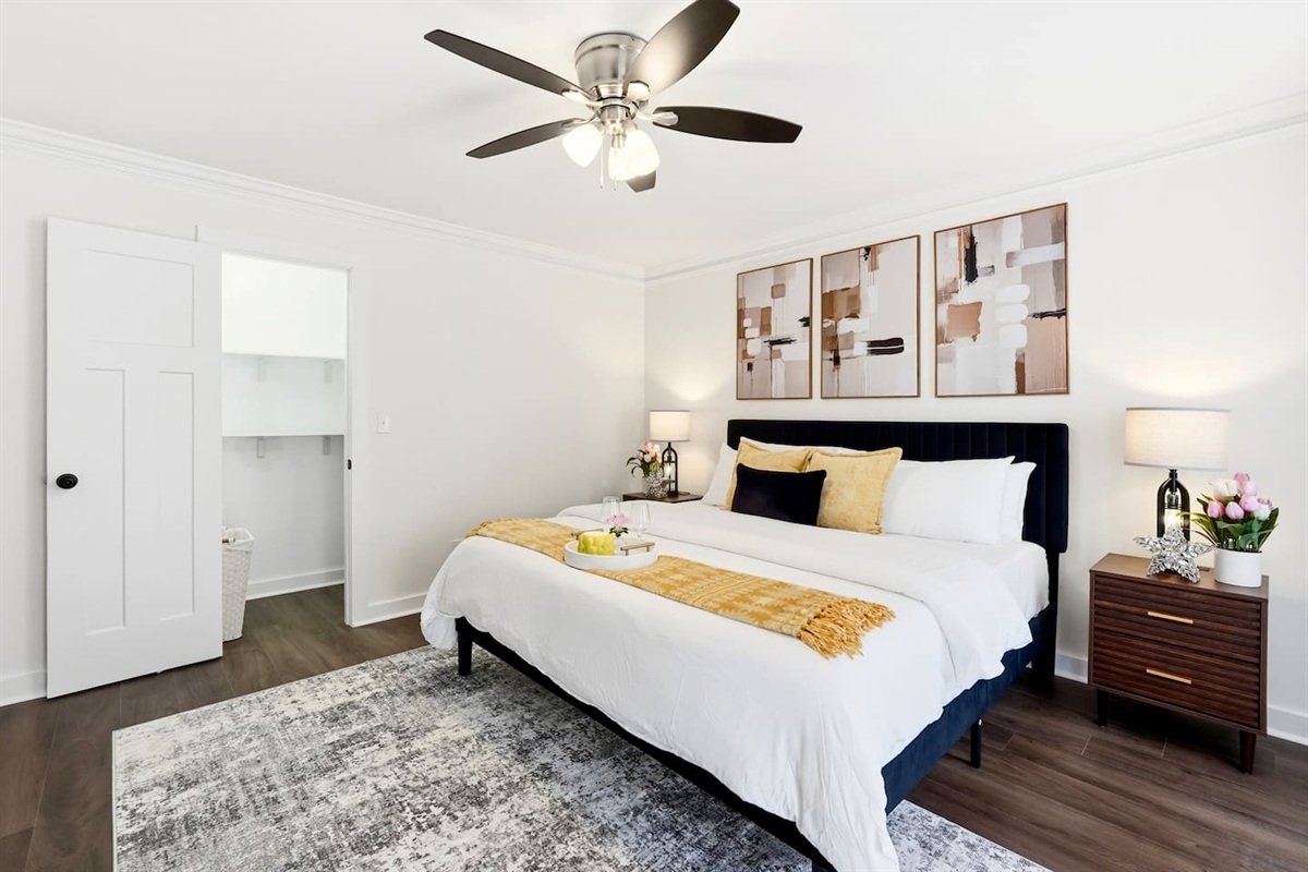 Another king bedroom located on the main level (no ensuite bathroom), a Roku-powered Smart TV, and located to the right as you enter the front door. This room includes 2 full-body towels, 2 washcloths, and 2 hand towels for your stay.