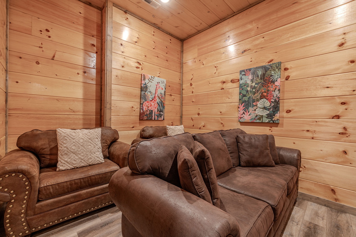 The Outpost Cinema is a dedicated theater room for movies, sports, streaming, and rainy-day downtime.