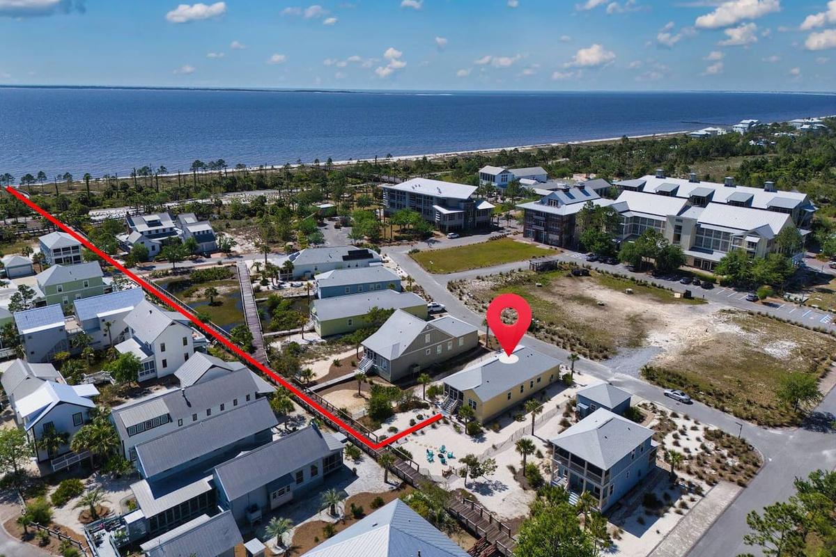 aerial view highlights the home's prime location and the easy walk to the beach