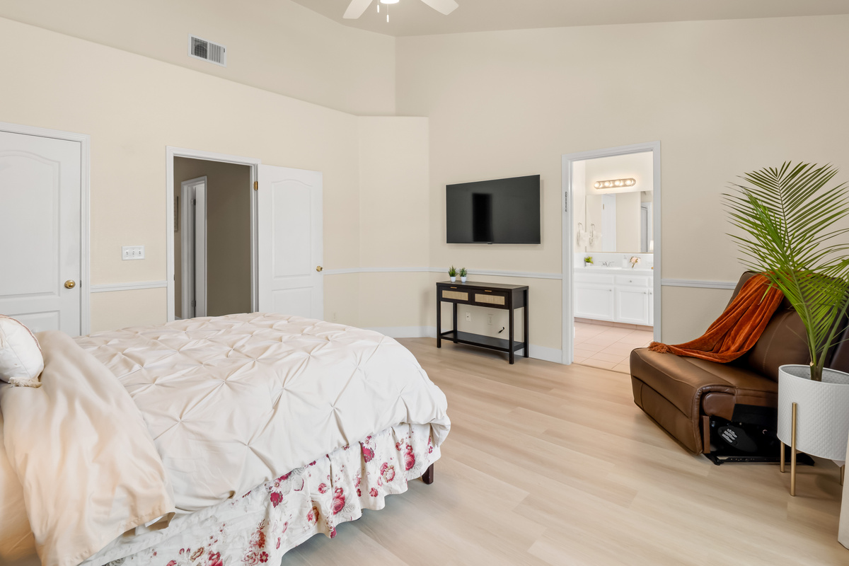 Curl up with a good book in the cozy chair or sink into the plush king bed after a day of adventure. This serene primary suite is designed to help you relax, recharge, and feel right at home.