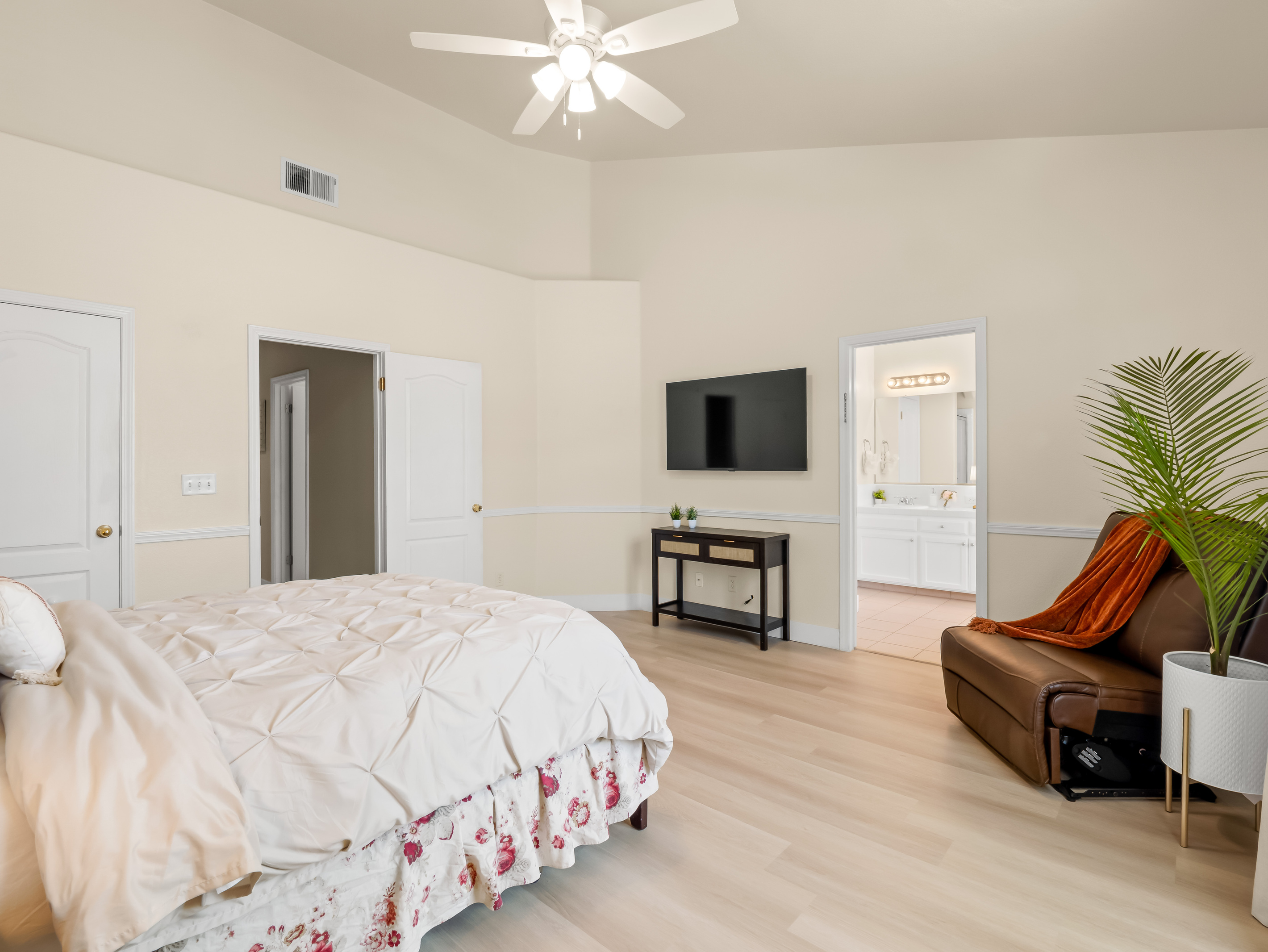 Curl up with a good book in the cozy chair or sink into the plush king bed after a day of adventure. This serene primary suite is designed to help you relax, recharge, and feel right at home.