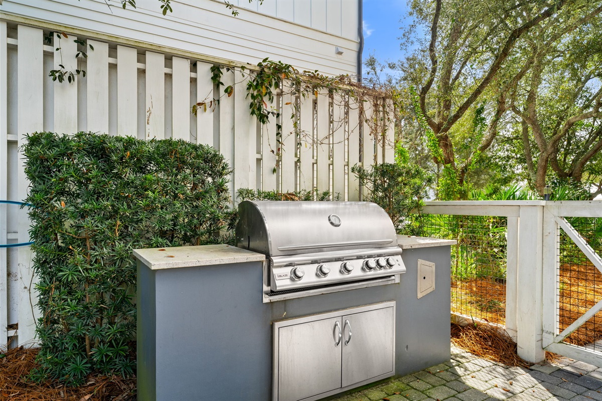 Side B: Nothing says vacation like a lakeside BBQ. Our outdoor grilling area is the perfect spot to prep dinner while the kids splash in the pool.