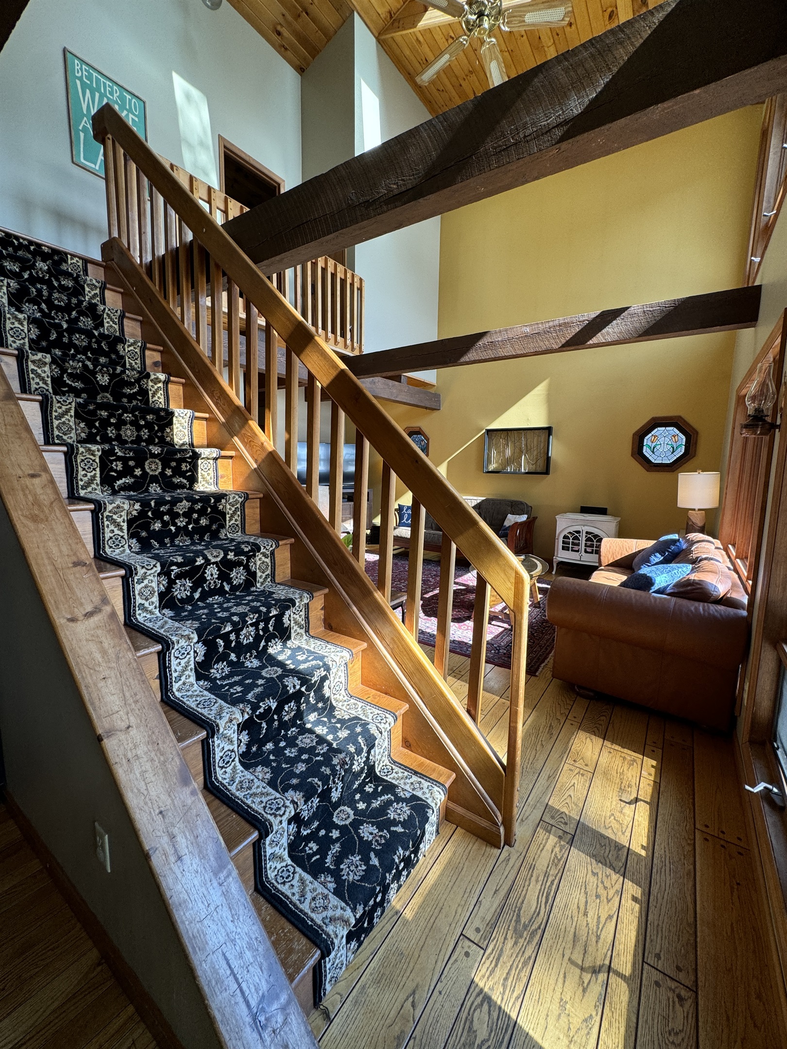 Camp Havon view from the dining room looking into the living room, the stairs leading to the 2nd floor bedrooms.