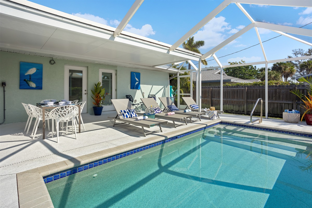 The perfect spot for lounging by the pool. Heated pool with lanai.