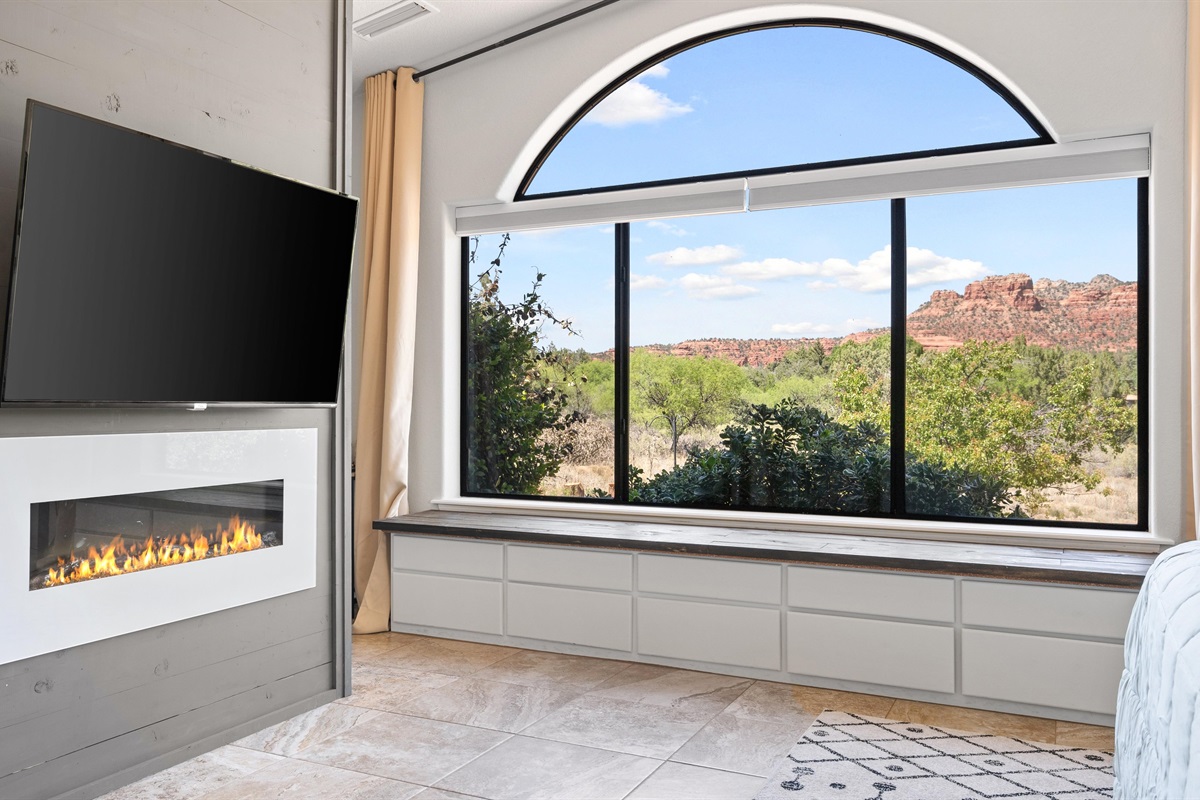 Cozy up next to the fireplace and enjoy those views!