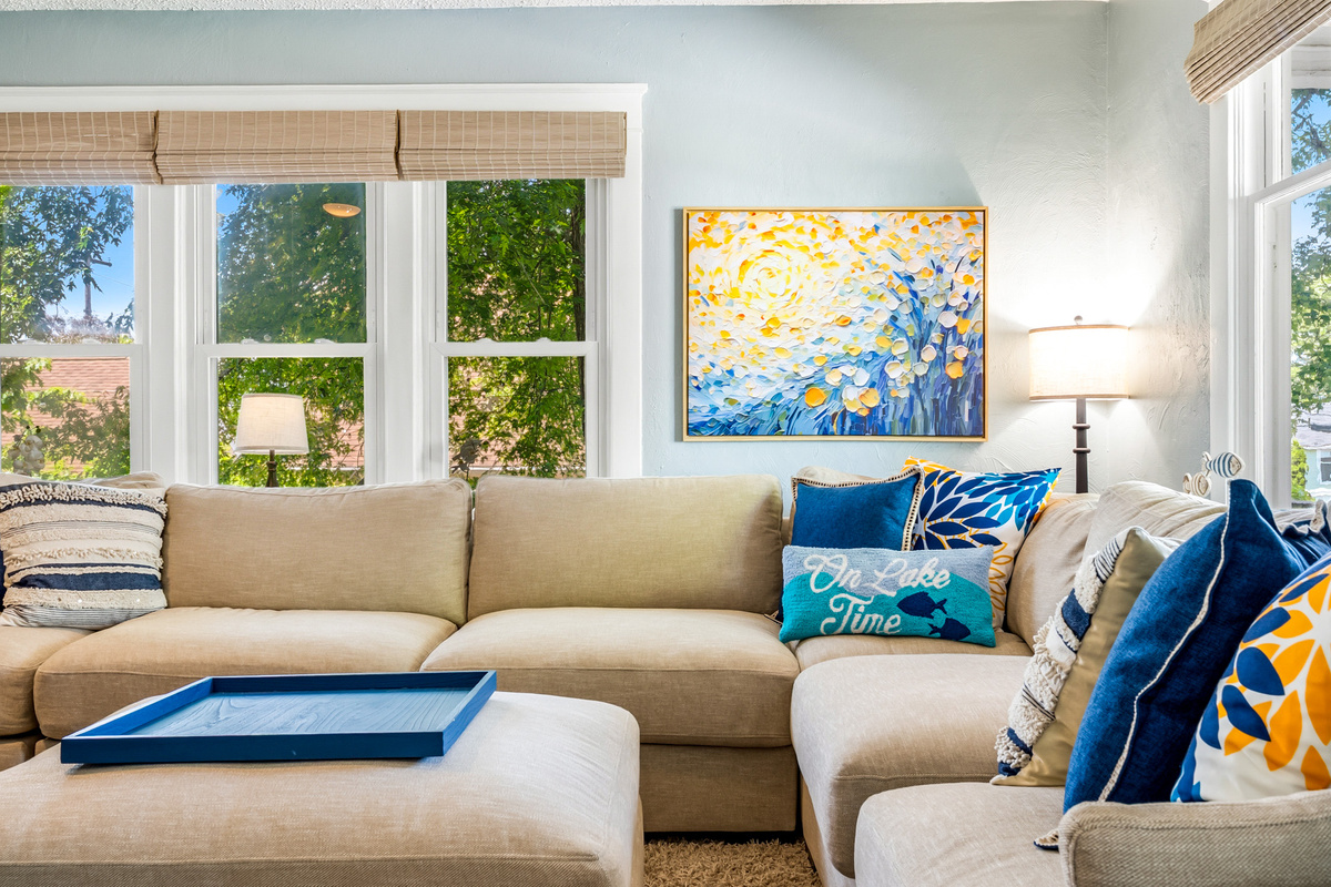 Bright, inviting, and styled to perfection. Relax on the main floor sectional and enjoy the subtle, intentional nods to Winona Lake living.