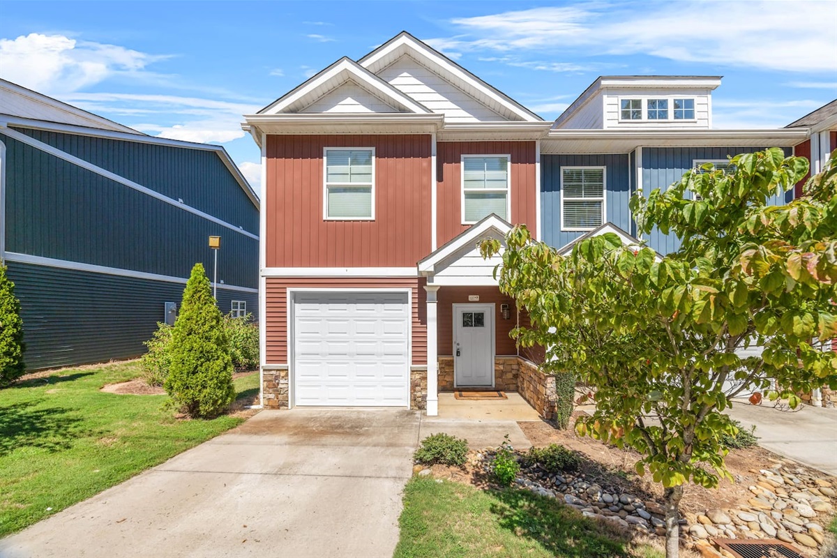 Welcome to your Spartanburg stay, featuring a modern facade with a private driveway and garage.