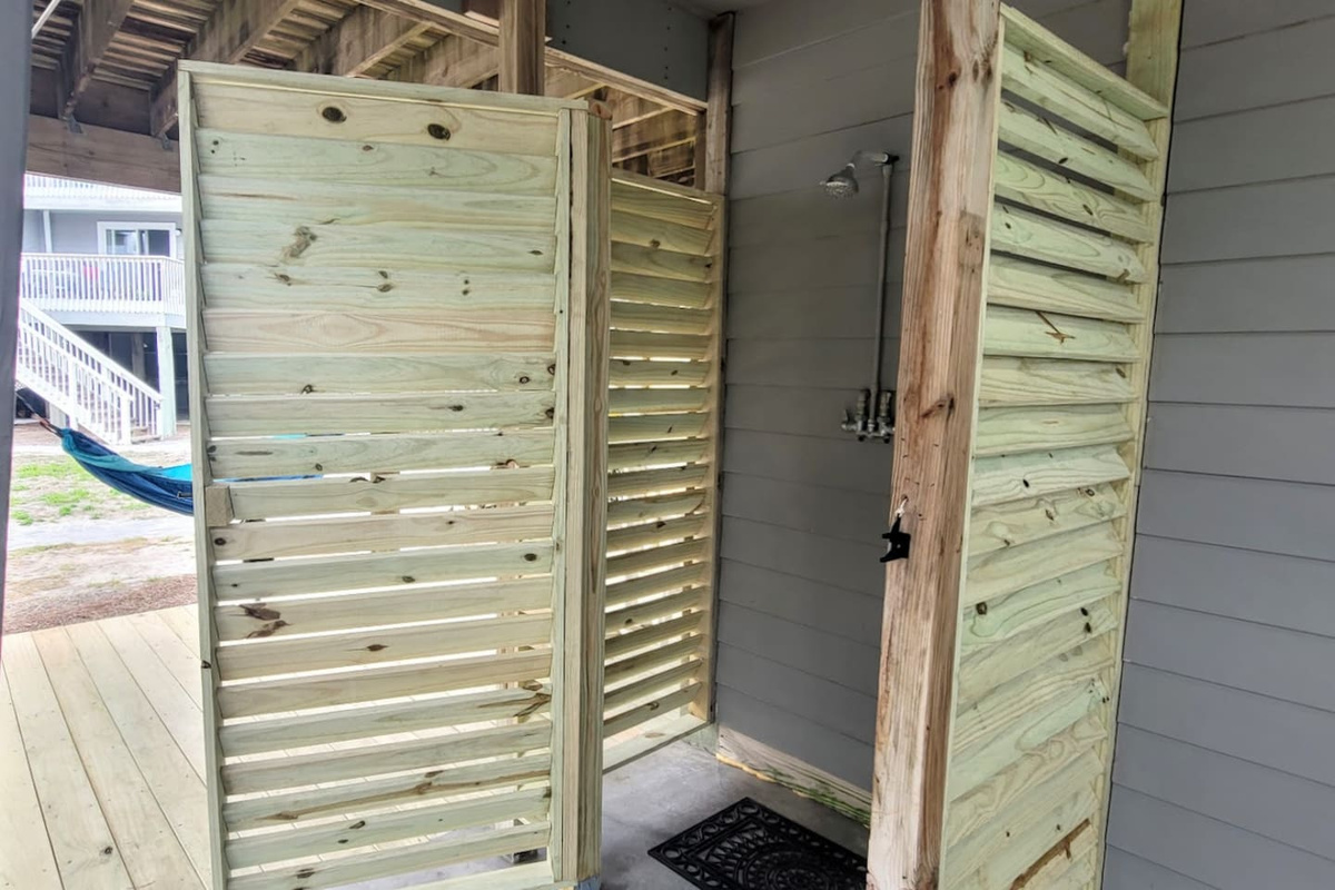 Rinse off the sand in the enclosed outdoor shower before you head inside &mdash; hot and cold water, full privacy.