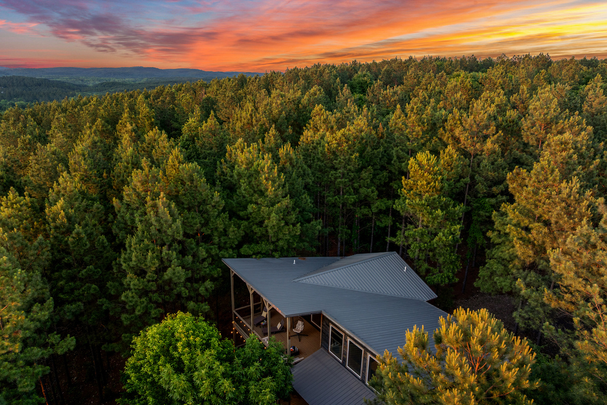 A welcoming cabin exterior surrounded by nature, offering a peaceful and private retreat from the moment you arrive. ✨