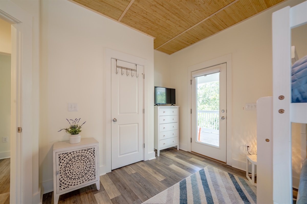Access to the second floor deck from the bunk bedroom