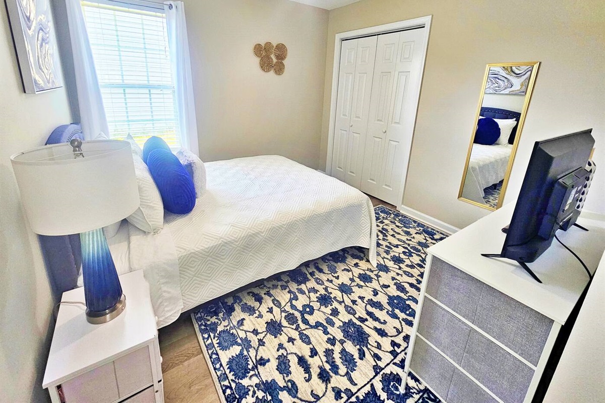 Full-length mirror & closet space.