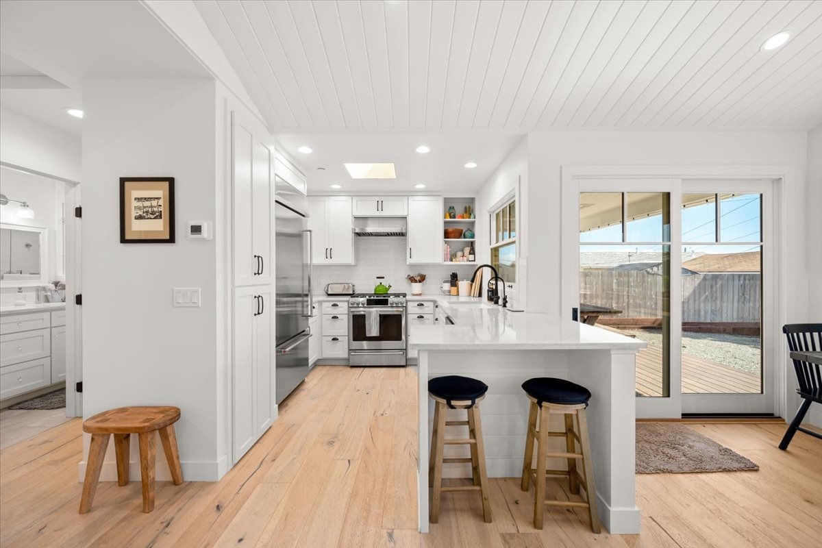 Fully custom and luxury kitchen with bar seating.