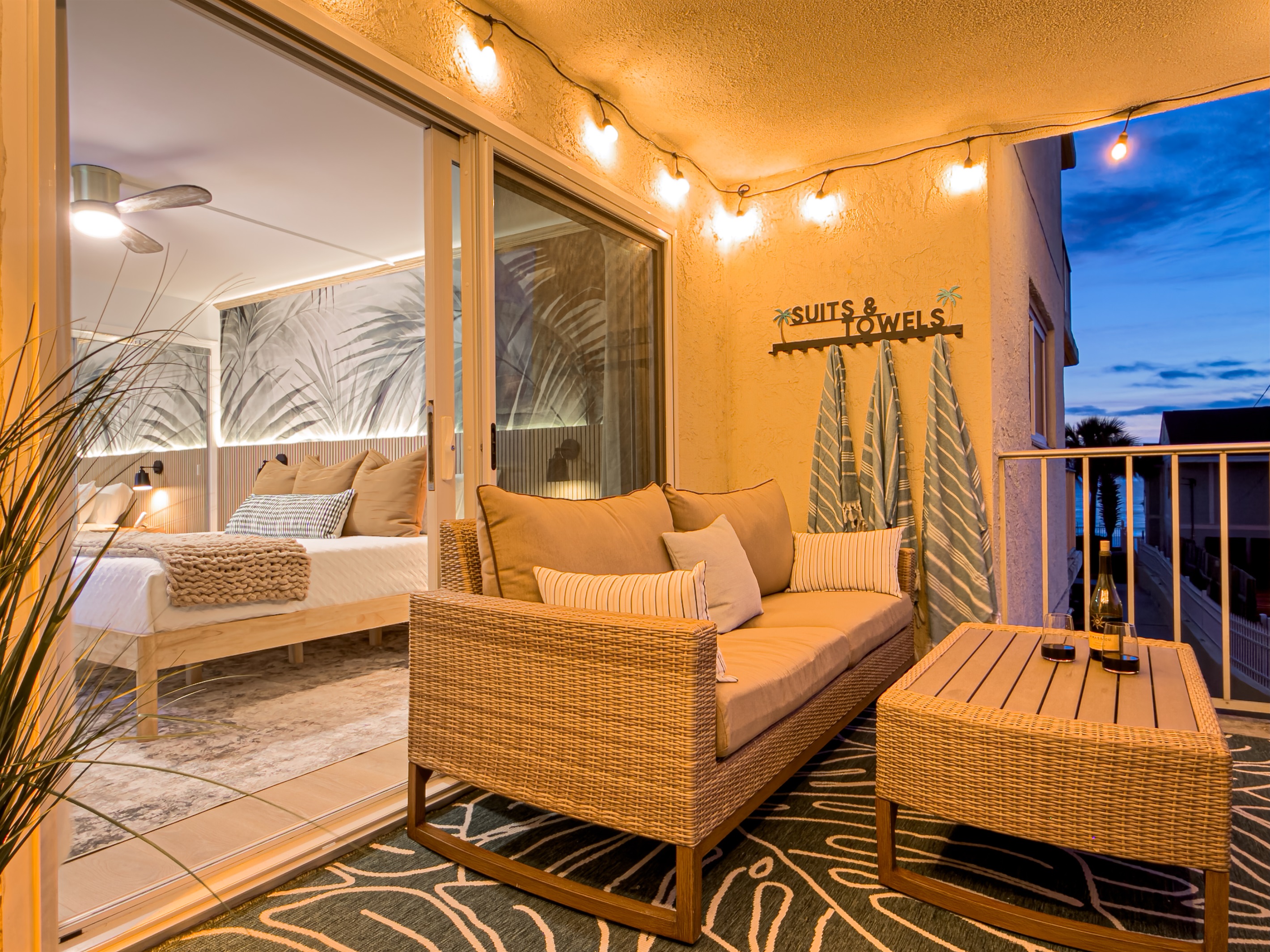 The beach is peaceful at twilight and offers a great view of the distant city lights.