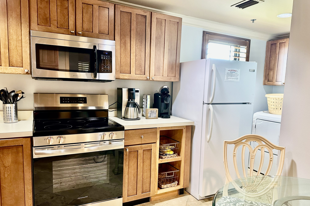 The laundry area is behind the fridge!  