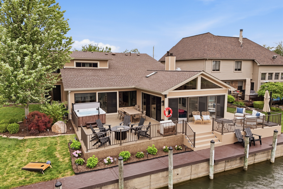 Waterfront home with private dock, spacious deck, and peaceful canal views perfect for relaxing and entertaining.