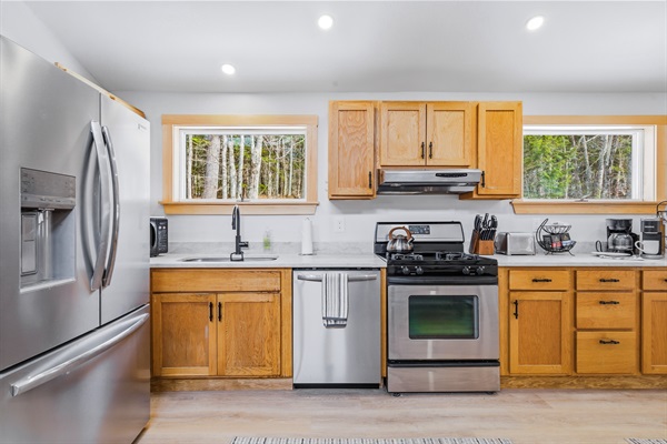 Keep the chef company at the counter while taking in the serene forest views from our oversized windows.