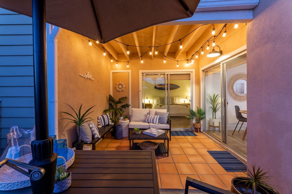 outdoor patio offers small storage space for beach equipment 