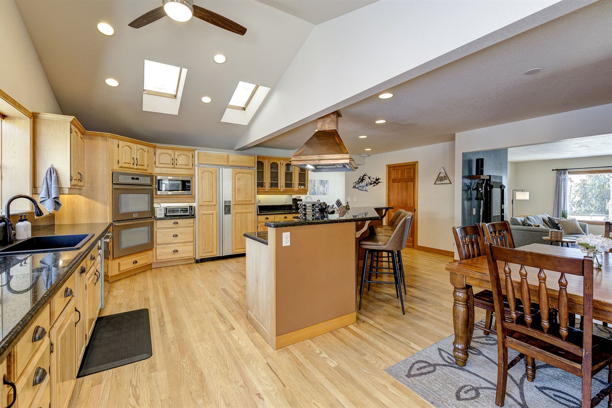 Kitchen with double ovens, Sub Zero fridge and large stove with indoor grill