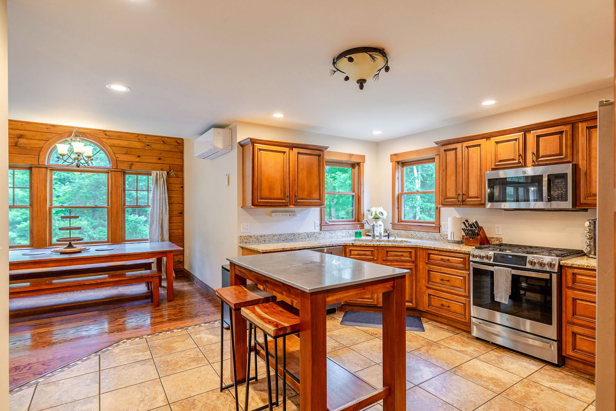 Open kitchen design keeps everyone connected while meals are being prepared.