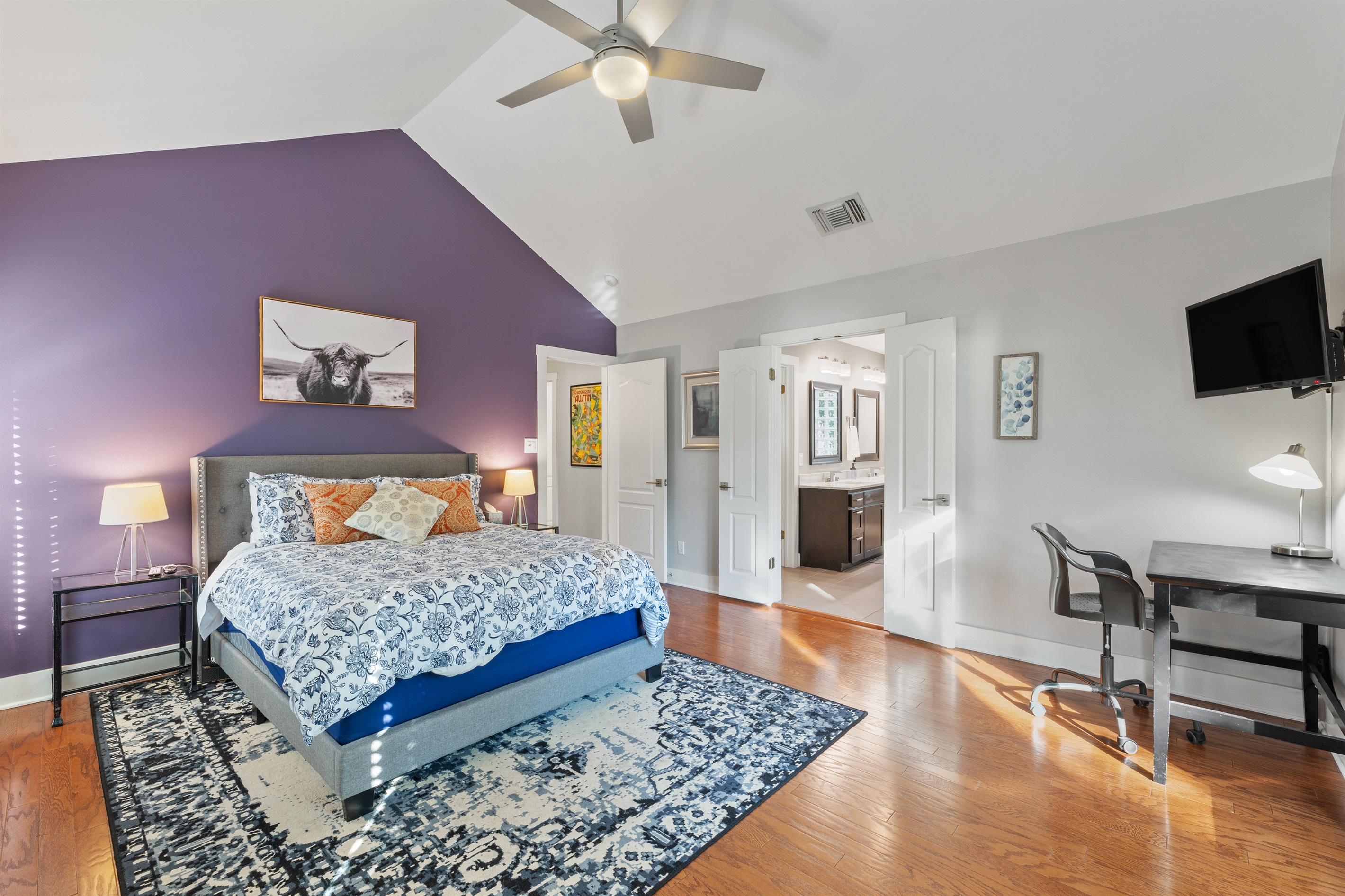 Vaulted ceilings in this huge Master Bedroom
