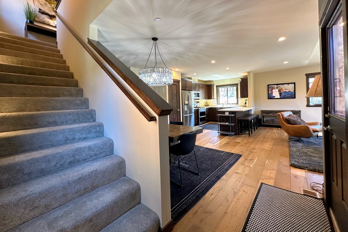 This three-story home is designed for easy living: park and enter on the first level, relax and entertain on the spacious second-floor living area, then head upstairs to find two primary bedrooms, baths.