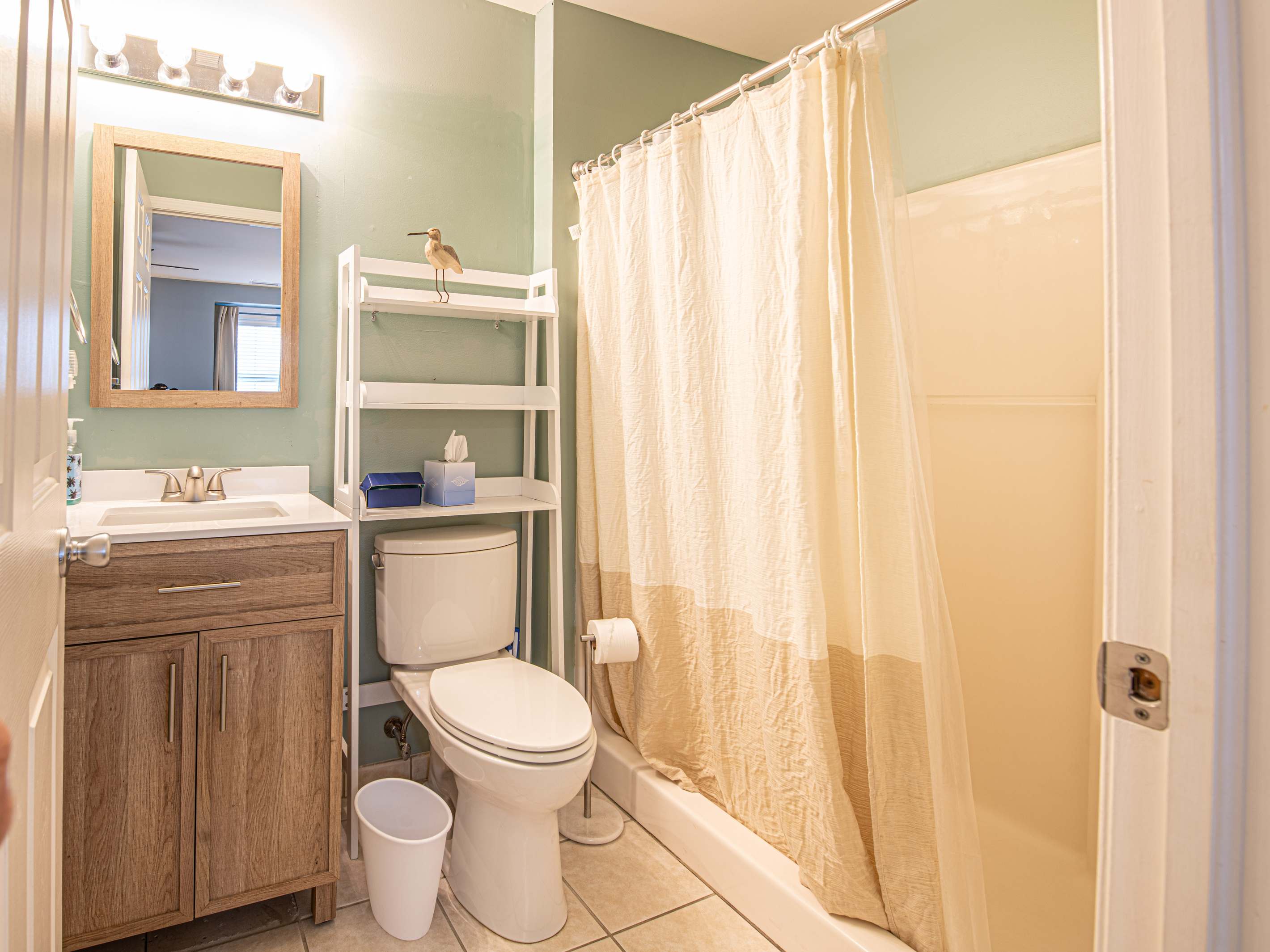 Bathroom 1 with Shelving Unit, and Shower
