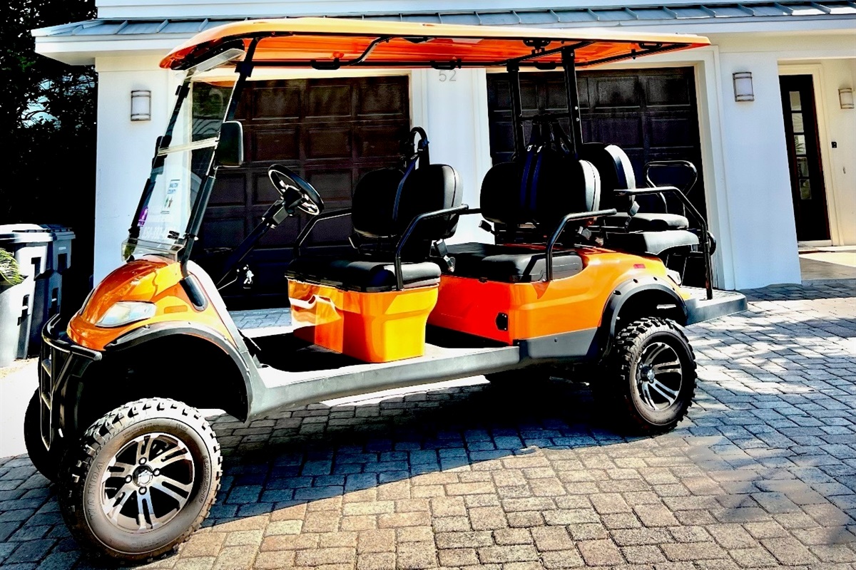 GOLF CART: Cruise the low-speed Scenic Gulf Drive in style and convenience with your private six-seater golf cart!