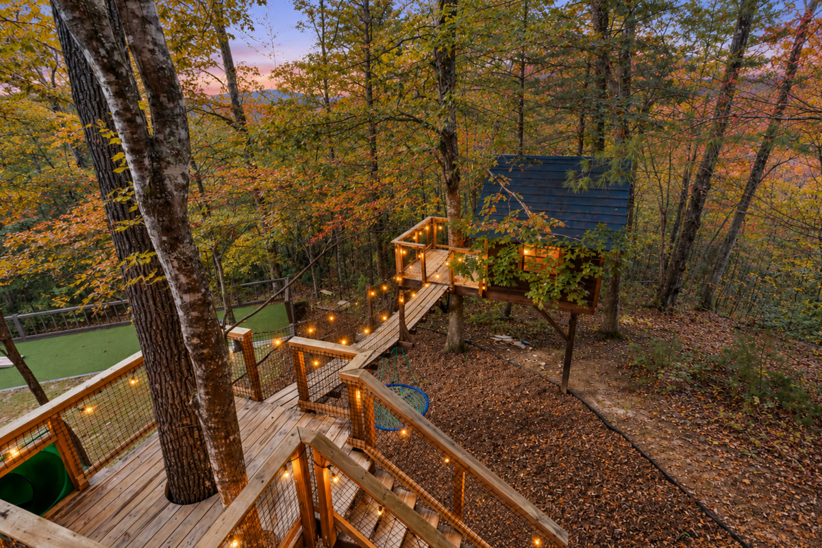 For little adventurers, magic awaits... a lighted treehouse that feels straight out of a dream.