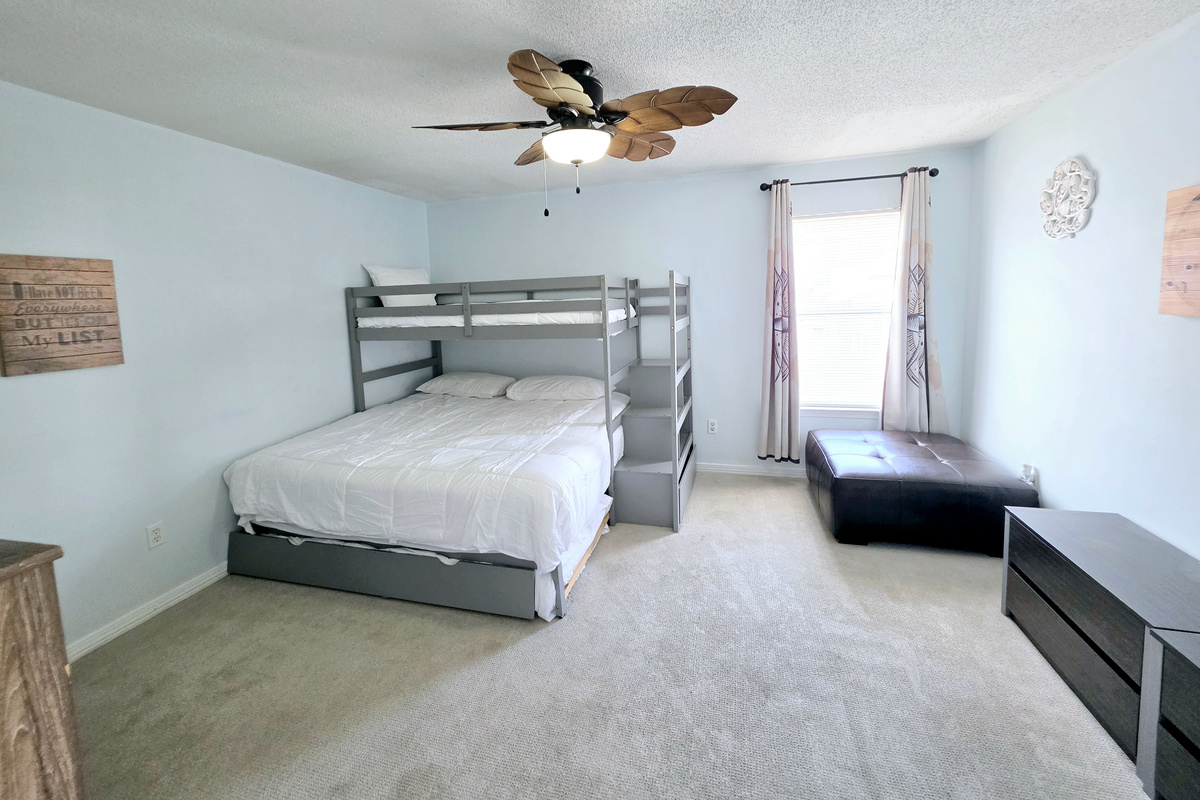 Bunk room with bunk bed and trundle