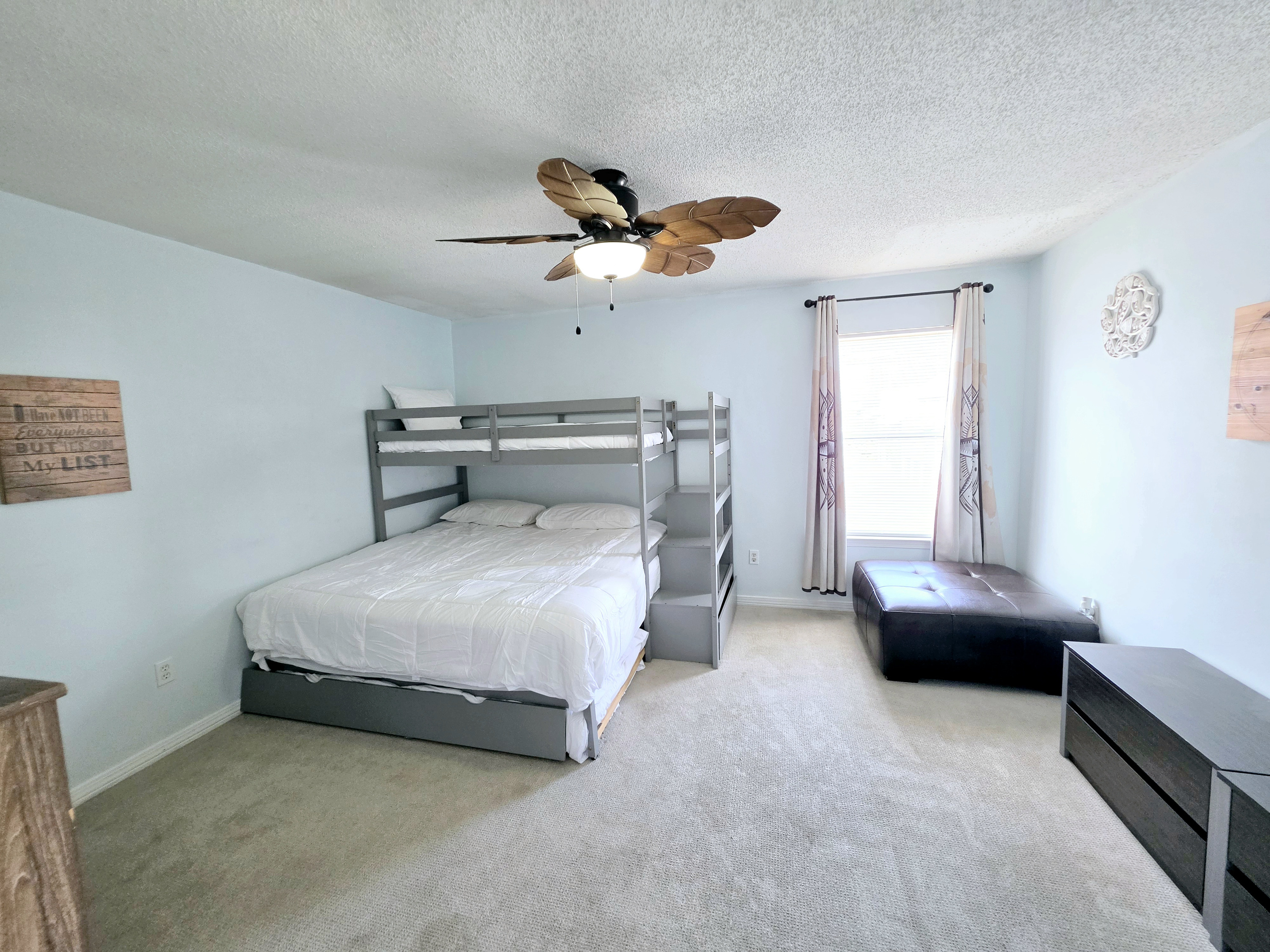 Bunk room with bunk bed and trundle