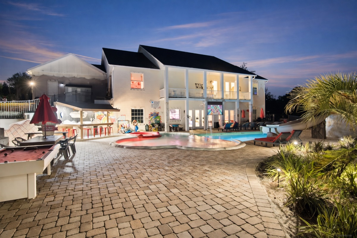 Grand estate glowing at night