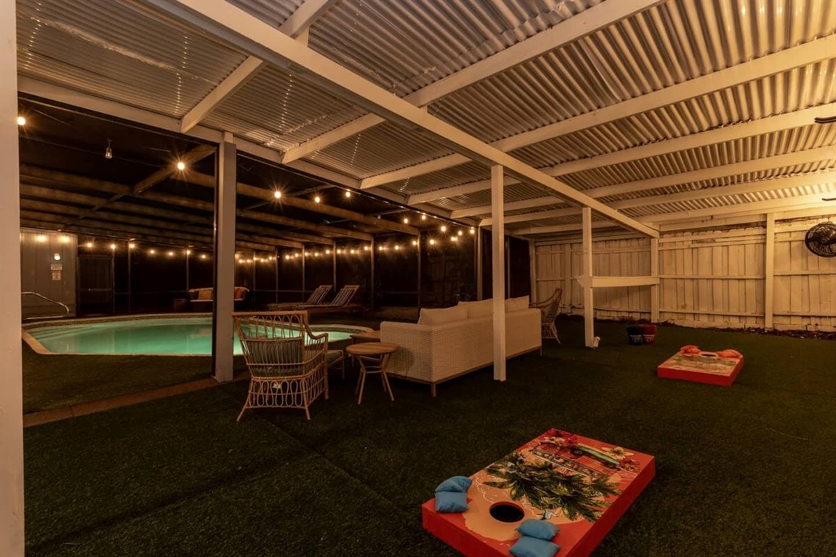 Screened Saltwater Pool with artificial non slip turf. Ping Pong, Bucket Ball, & Corn Hole.