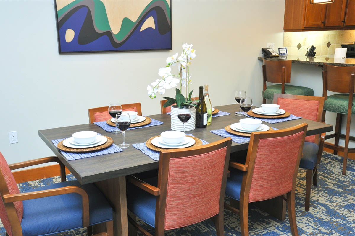 Bar area and open dining room. Dining table seats 6, bar area seats 3