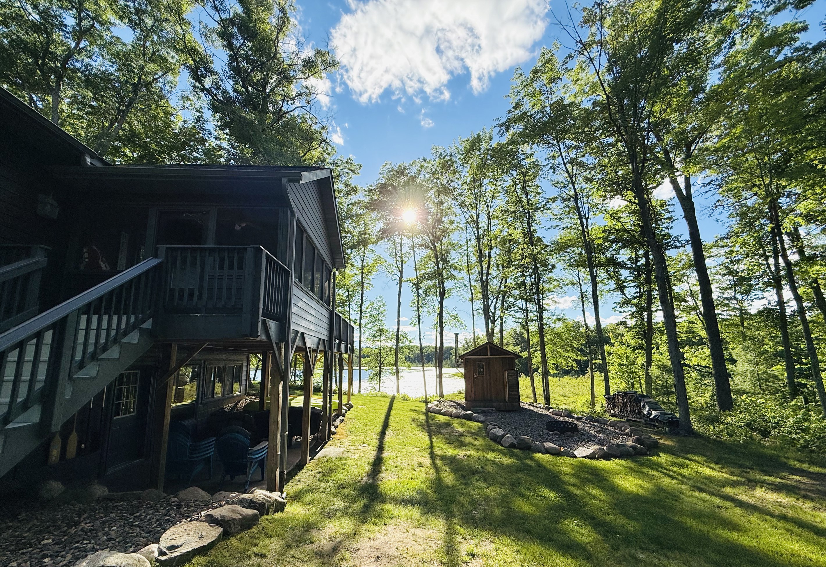 Our authentic wood burning sauna with a great view of the lake.