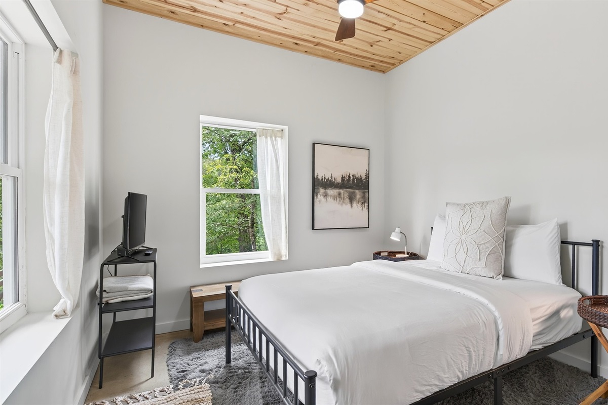 Bedroom 2 is located on the lower level