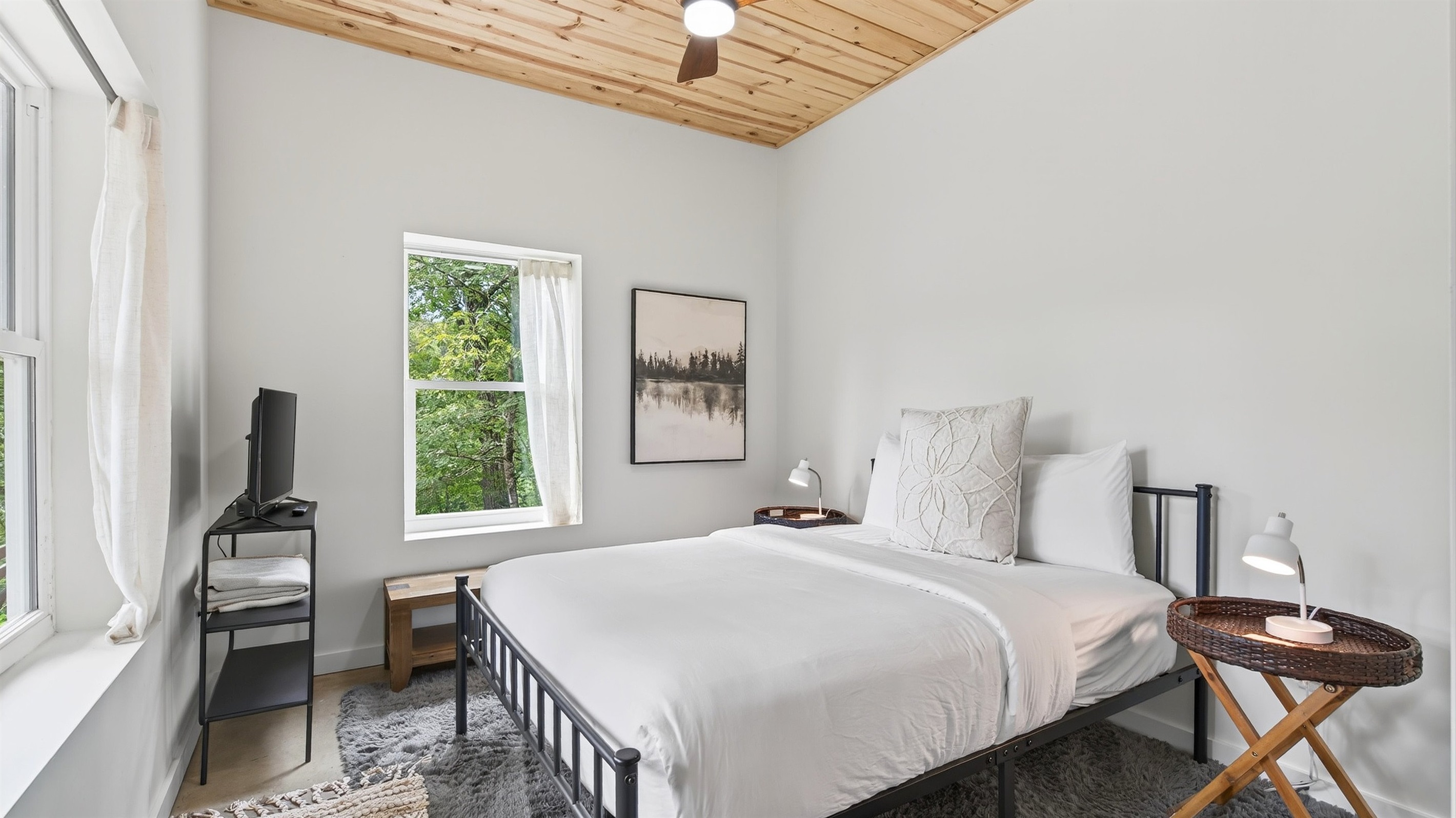 Bedroom 2 is located on the lower level