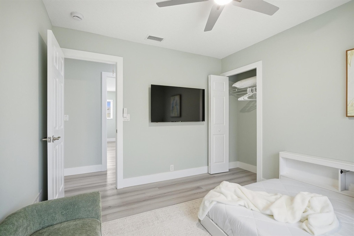 Bedroom 3 - Full-size bed, a closet, and TV.  